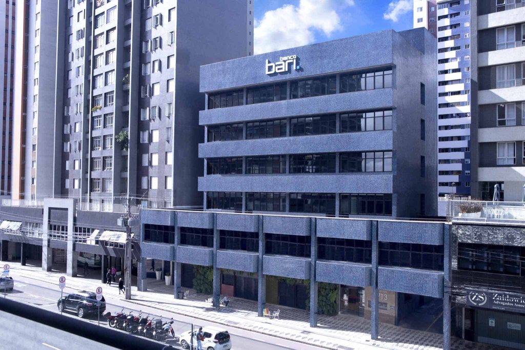 imagem de uma avenida com diversos prédios, onde fica a sede do banco Bari, em Curitiba